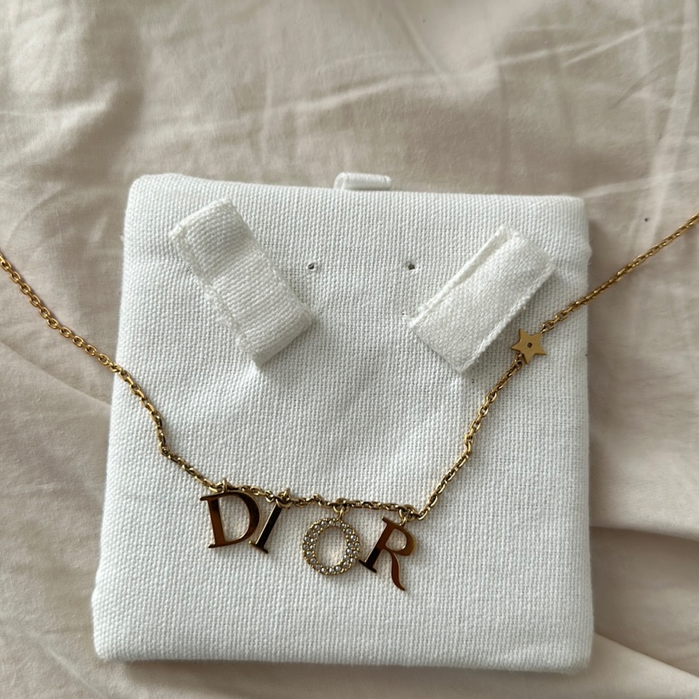 DIOR necklace with receipt and box and jewelry bag